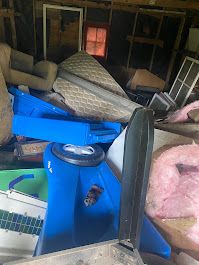 Garage cleanout before and after — Before